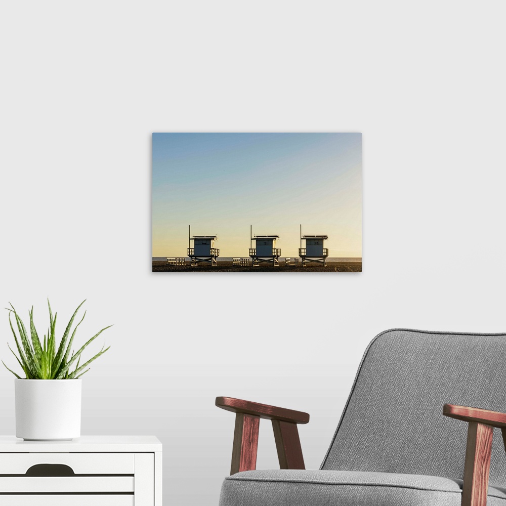 A modern room featuring USA, California, Los Angeles, Venice Beach, Lifeguard towers at sunset.