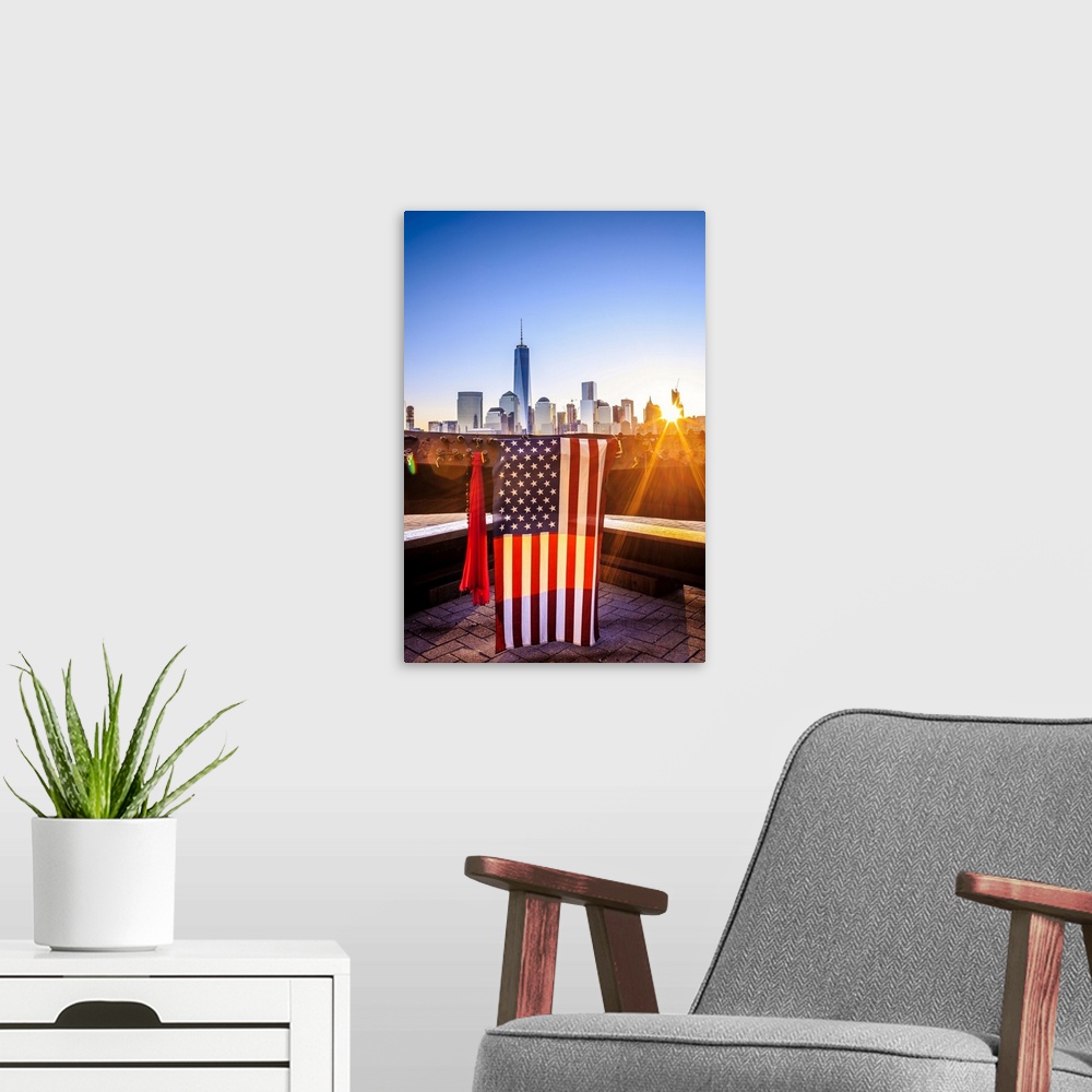 A modern room featuring USA, New Jersey, 9-11 memorial in New Jersey, American flags on a steel bar of the destroyed Twin...