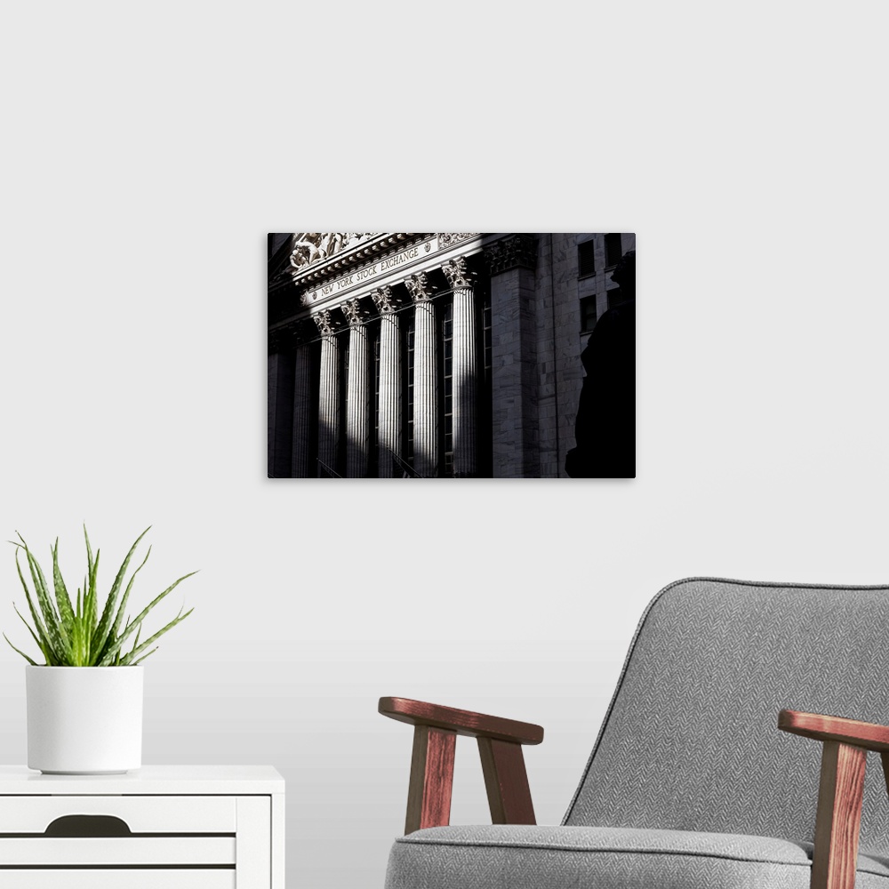 A modern room featuring USA, New York City, Wall Street, The New York Stock Exchange.