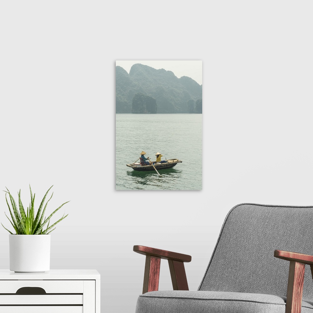 A modern room featuring Vietnam, Northeast, North Vietnam, Coast, Halong Bay, Women in a rowing boat with Cat Ba Island i...