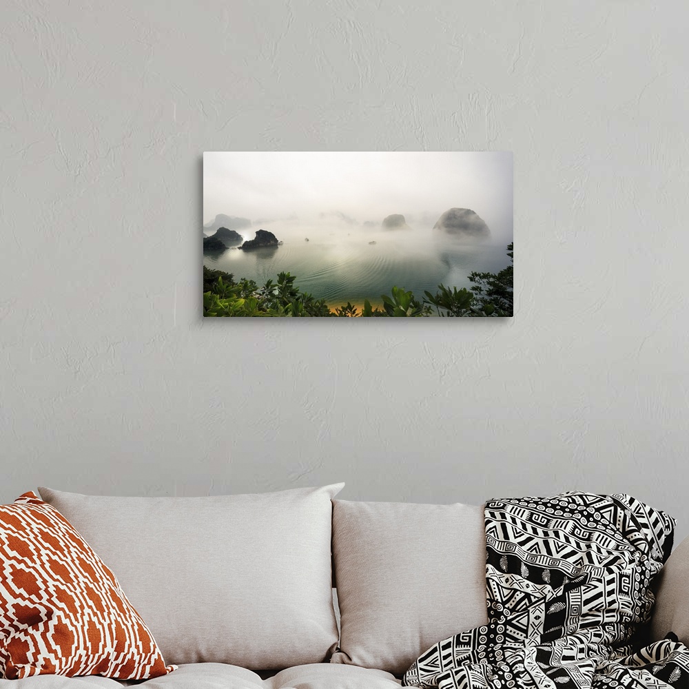 A bohemian room featuring Vietnam, Northeast, Halong Bay, Mist above waters of Halong Bay.