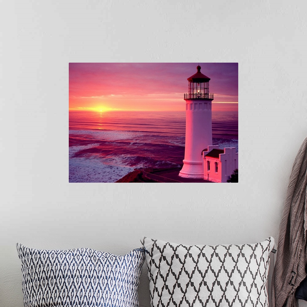 A bohemian room featuring Washington, Cape Disappointment, lighthouse at sunset
