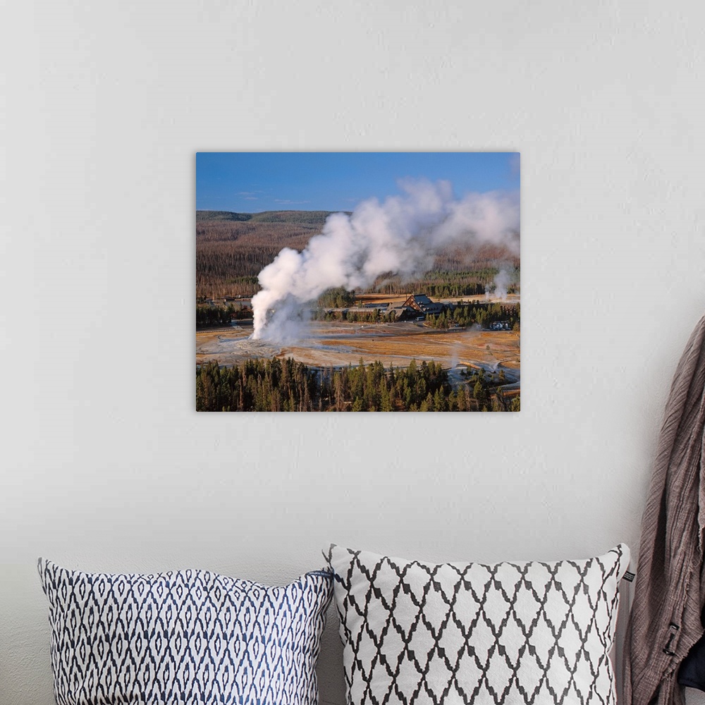 A bohemian room featuring United States, USA, Wyoming, Yellowstone National Park, Old Faithful Geyser erupting in the morni...