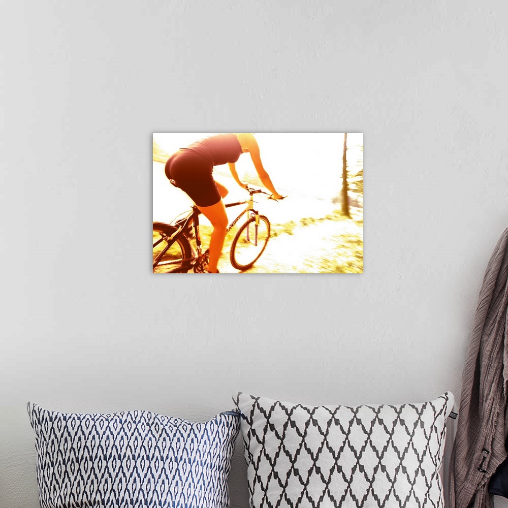 A bohemian room featuring Young woman mountain biking
