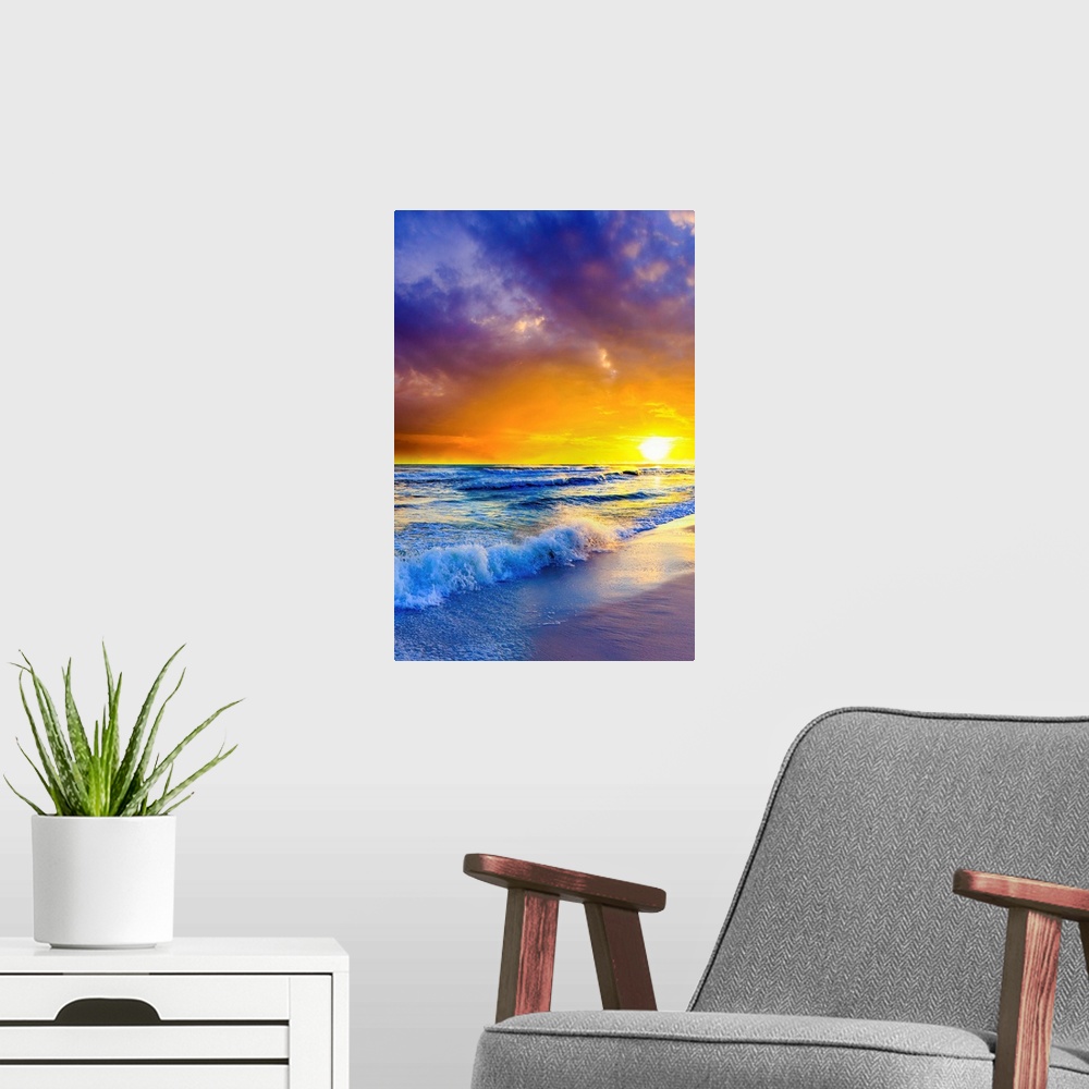 A modern room featuring Purple clouds reach out beyond an orange sunset over the ocean. A great sunset to print on canvas.