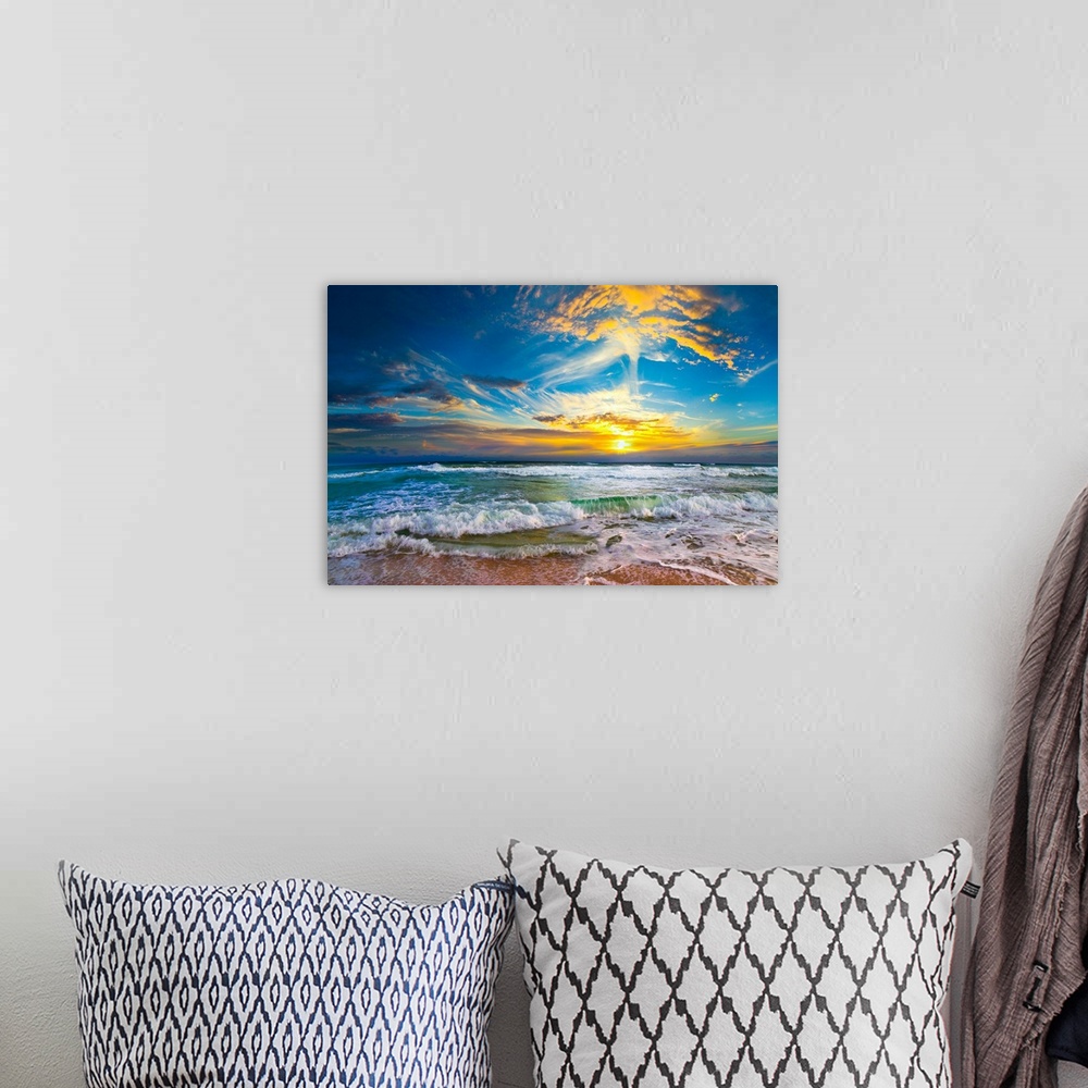 A bohemian room featuring This beautiful beach sunset pictures the eternal sea as it disappears into a beautiful yellow sun...