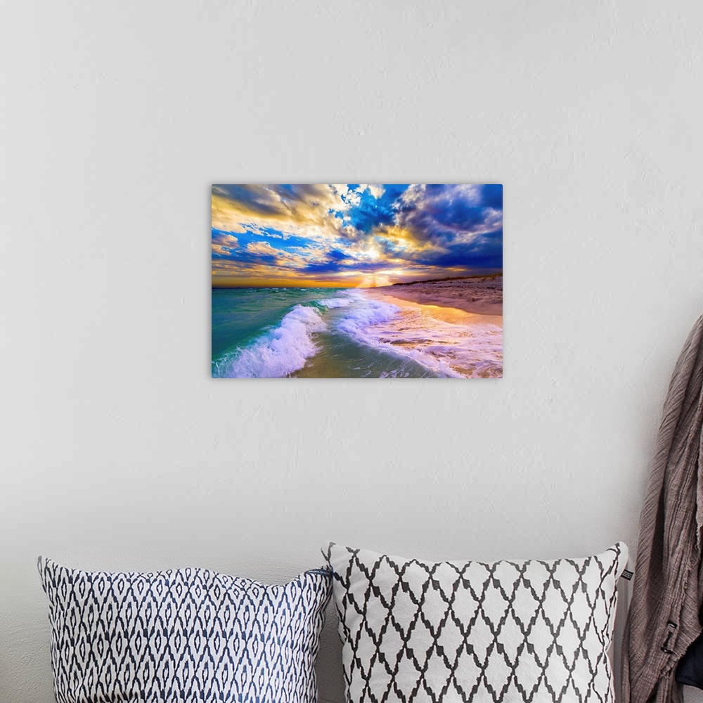 A bohemian room featuring Breaking waves over a blue beach under a sunset in Florida.