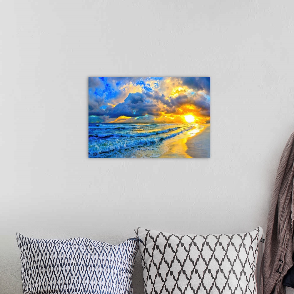 A bohemian room featuring A beautiful ocean sunset with layered waves and shore in this blue art print.