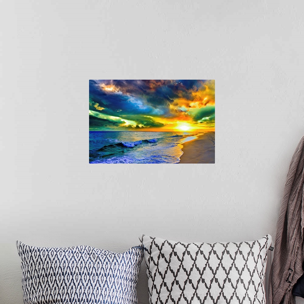 A bohemian room featuring A beautiful sea at sunset in this landscape photo. A seascape with waves on the shore before a be...