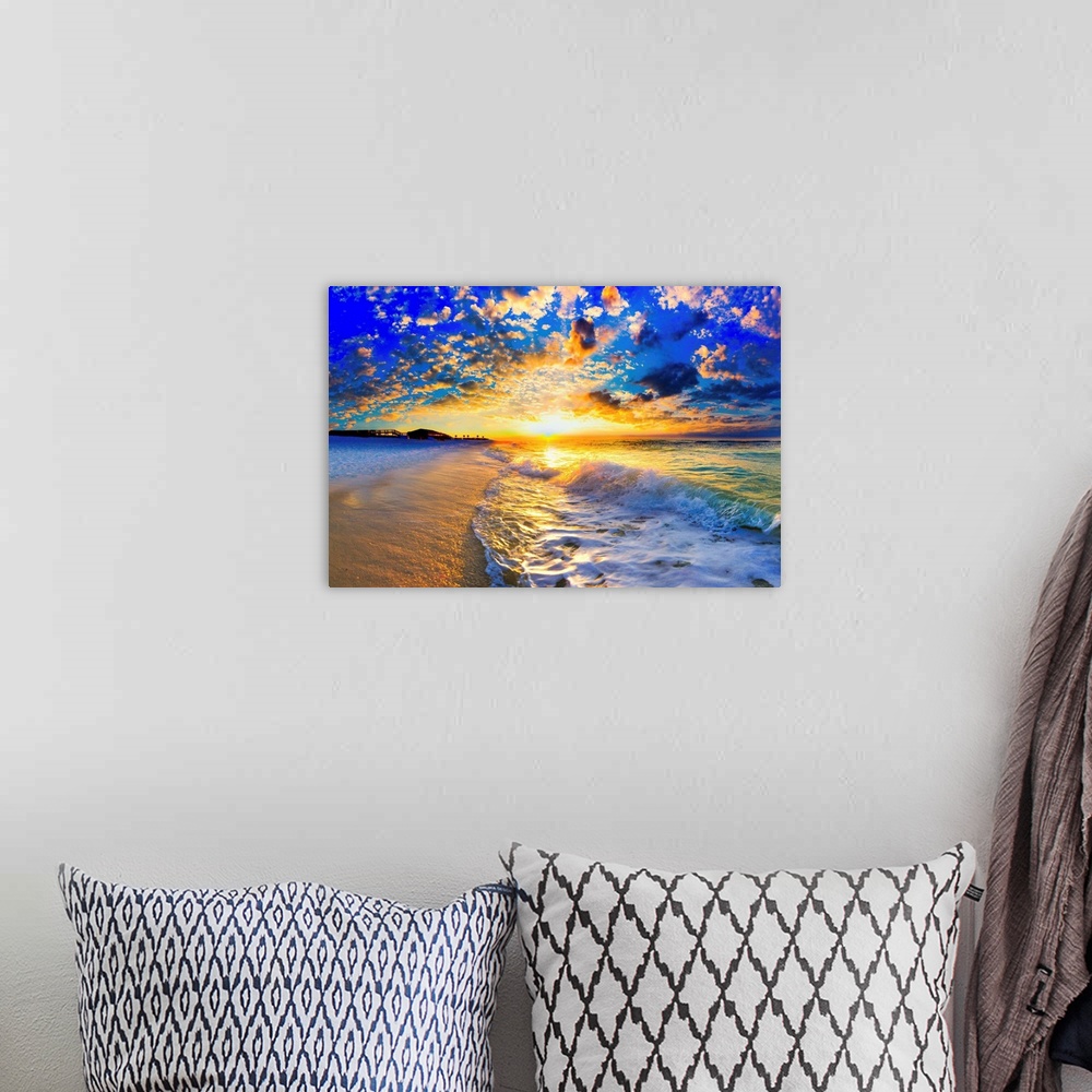 A bohemian room featuring Ocean landscape photograph of a beautiful ocean sunset.
