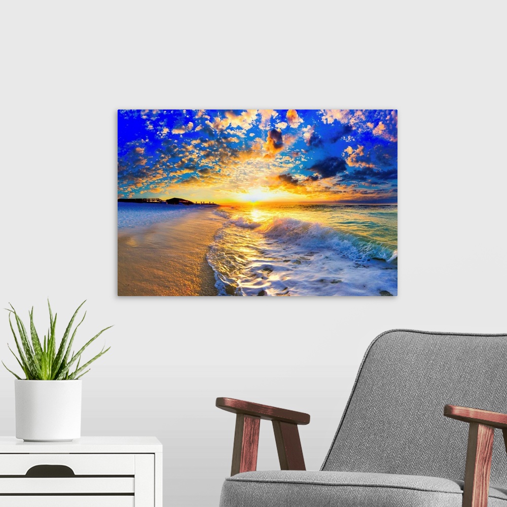 A modern room featuring Ocean landscape photograph of a beautiful ocean sunset.