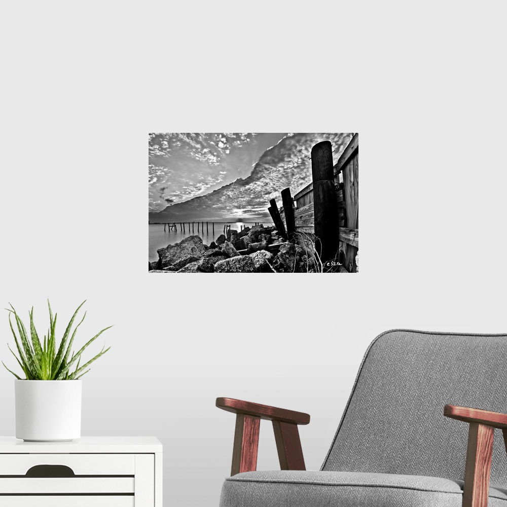 A modern room featuring A broken sea wall in vintage black and white.