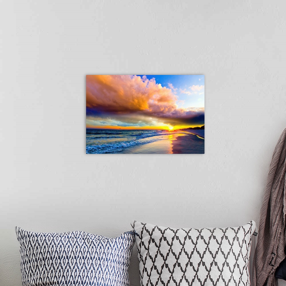 A bohemian room featuring Heaven and earth colorful landscape featuring the sea below a sunset with the colors of heaven. D...
