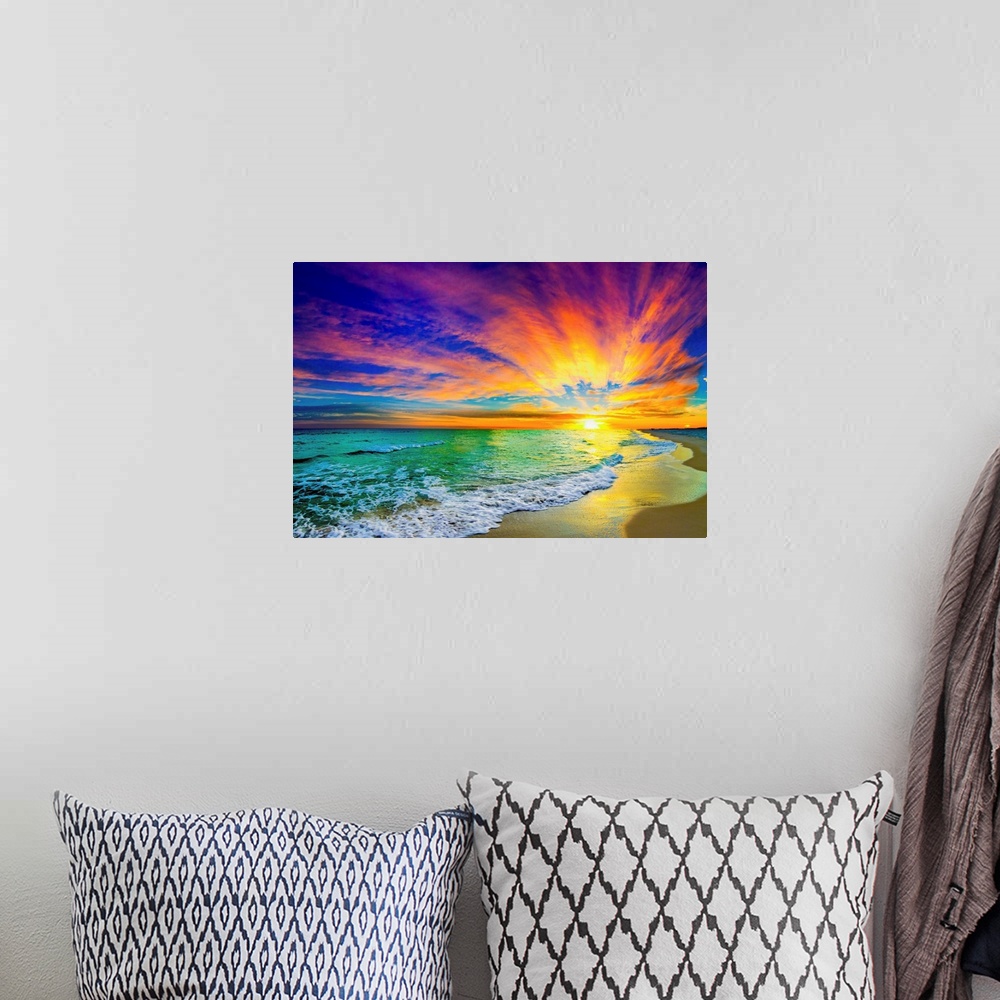 A bohemian room featuring A landscape of a colorful ocean sunset in this green sea photo. An art print featuring waves on t...