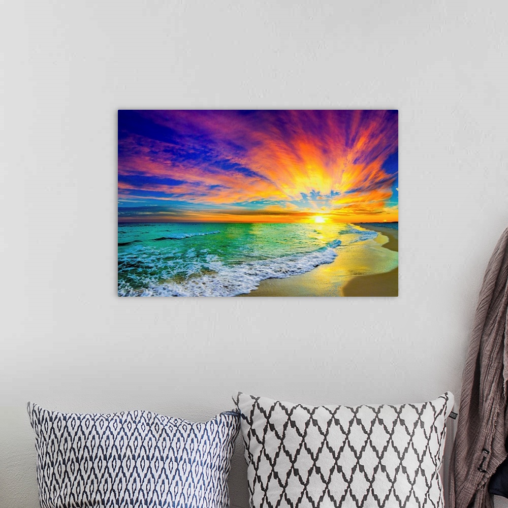 A bohemian room featuring A landscape of a colorful ocean sunset in this green sea photo. An art print featuring waves on t...