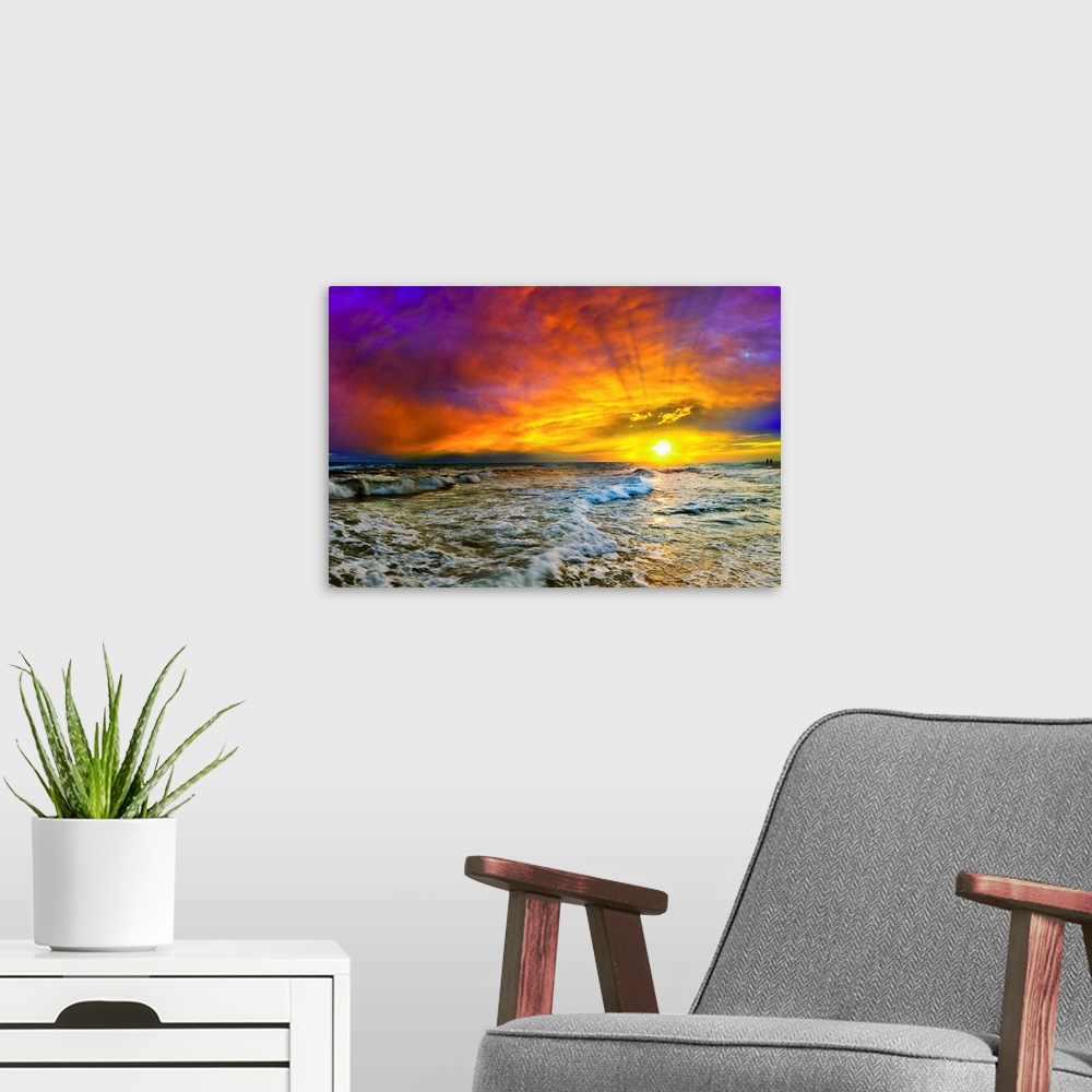 A modern room featuring A seascape sunset with fiery red clouds at a beach in Destin, Florida.