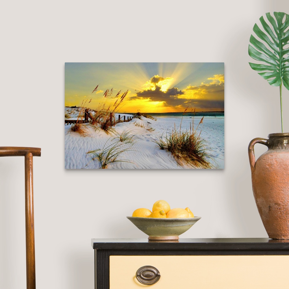 A traditional room featuring Landscape photograph of a golden beach sunset along a beautiful coast. This golden sunset has mag...