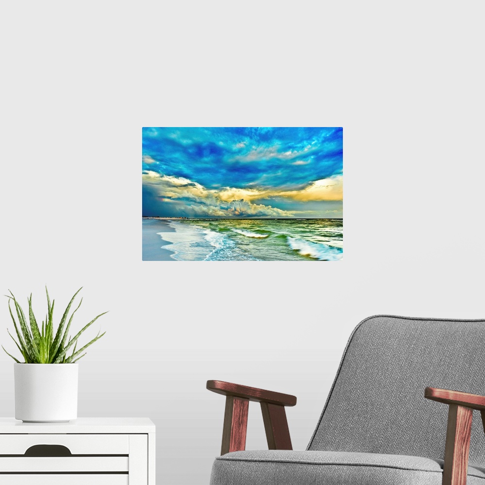 A modern room featuring A blue and turquoise sea with a painted looking sunset. This makes for a beautiful landscape phot...