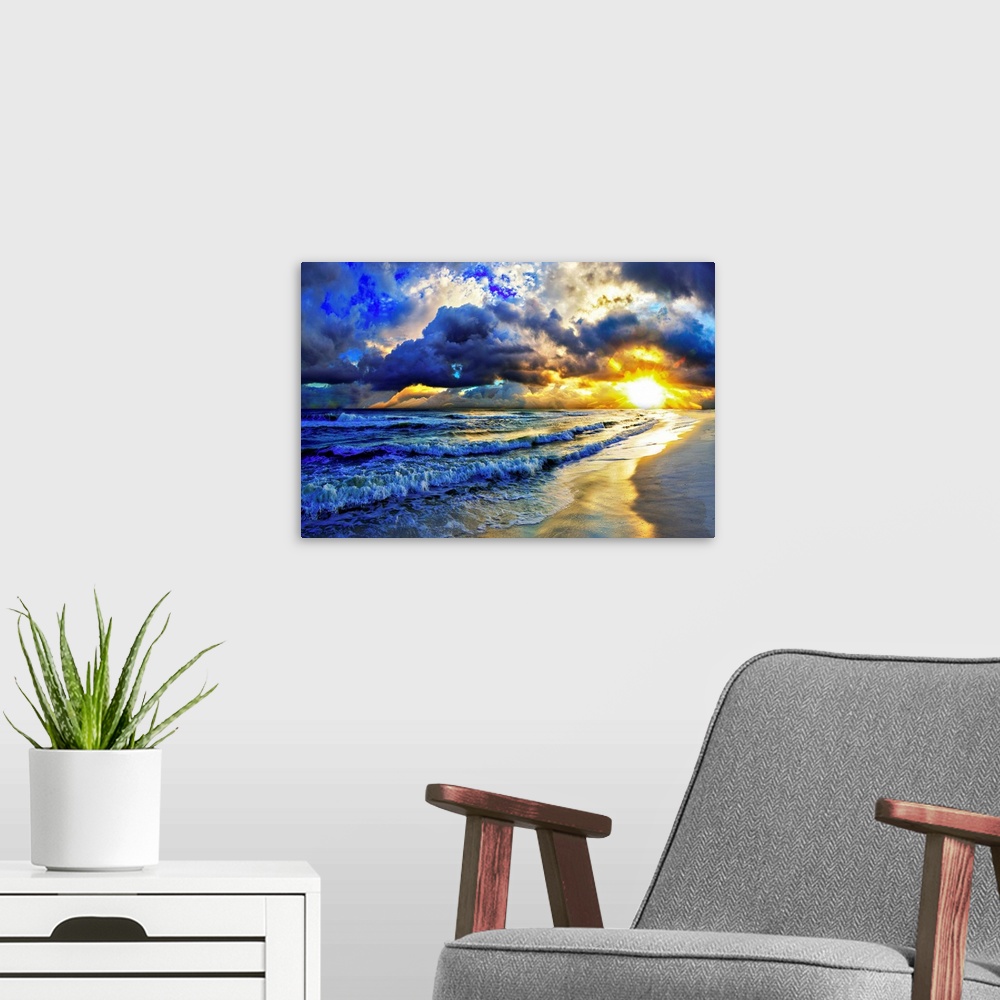 A modern room featuring A beautiful ocean landscape featuring a beach sunset with dark and bright amazing layered clouds.