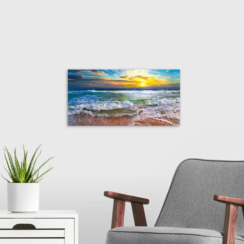 A modern room featuring This panoramic beach sunset features breaking waves on a beautiful sea shore. A wave crashes on t...