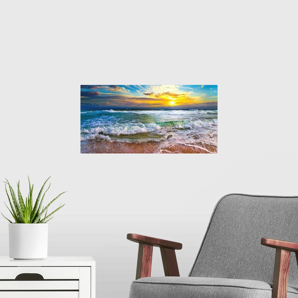 A modern room featuring This panoramic beach sunset features breaking waves on a beautiful sea shore. A wave crashes on t...