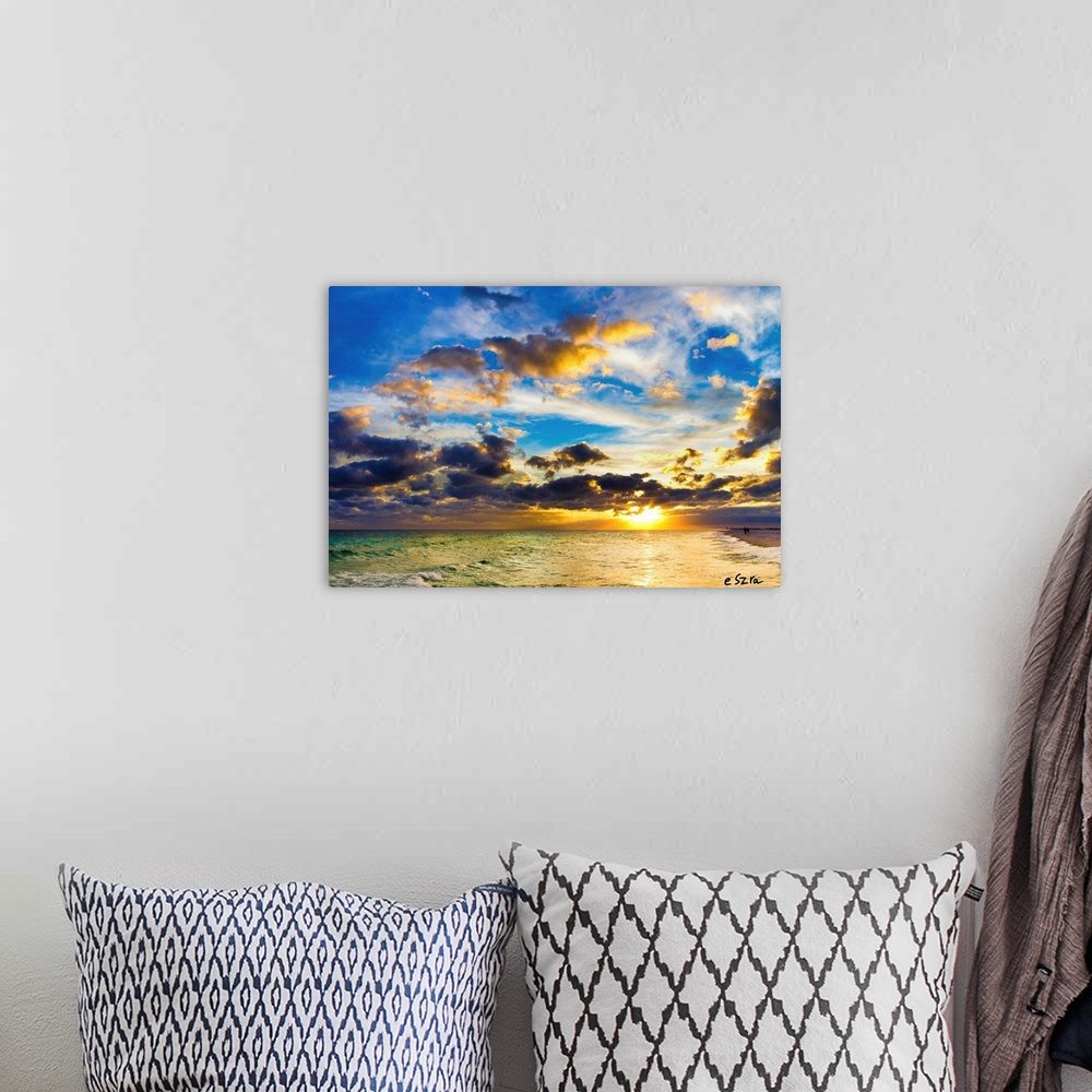 A bohemian room featuring Blue and gold cloudscape in Pensacola Florida during a bright sunset.