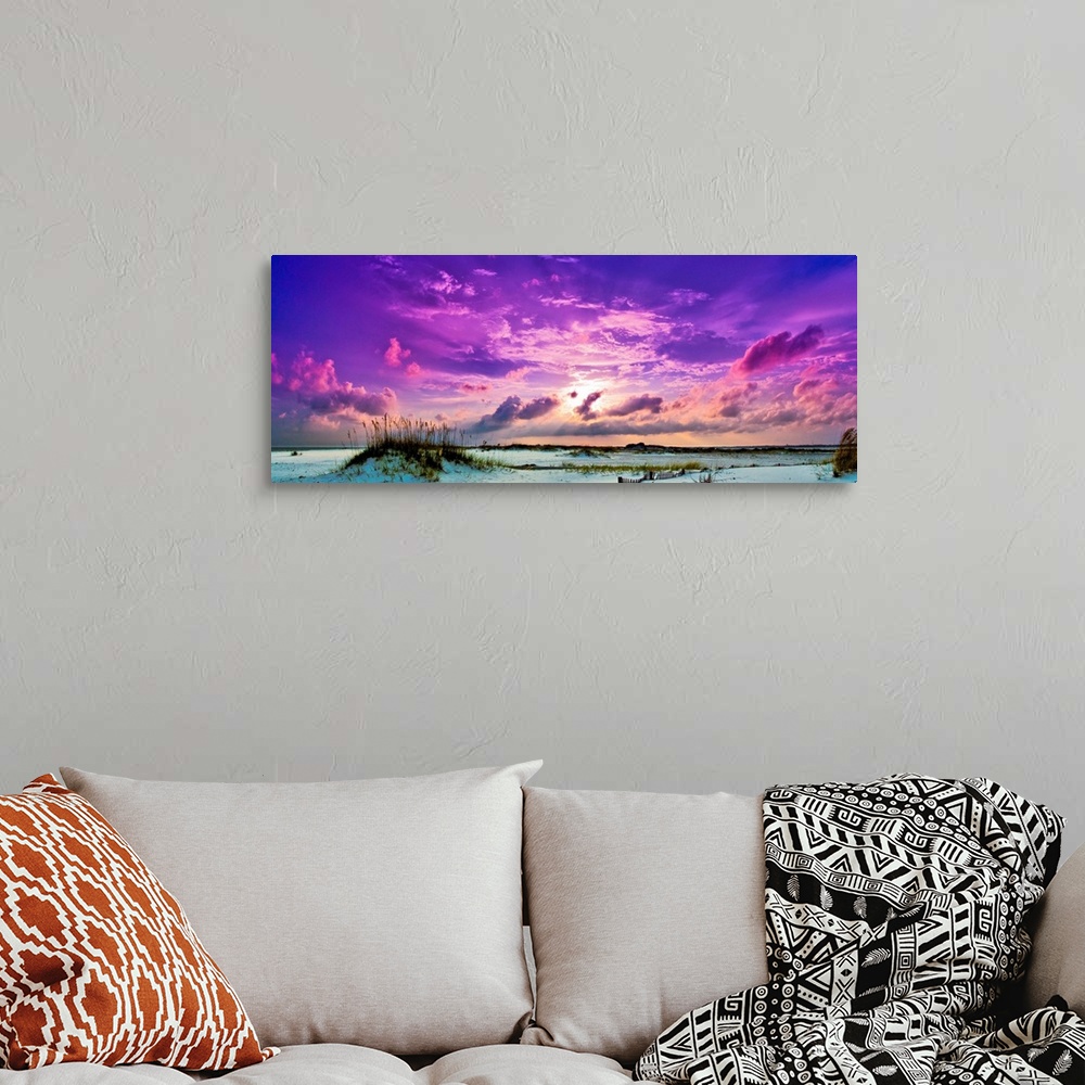 A bohemian room featuring Heavenly purple sunset skyscape panorama.