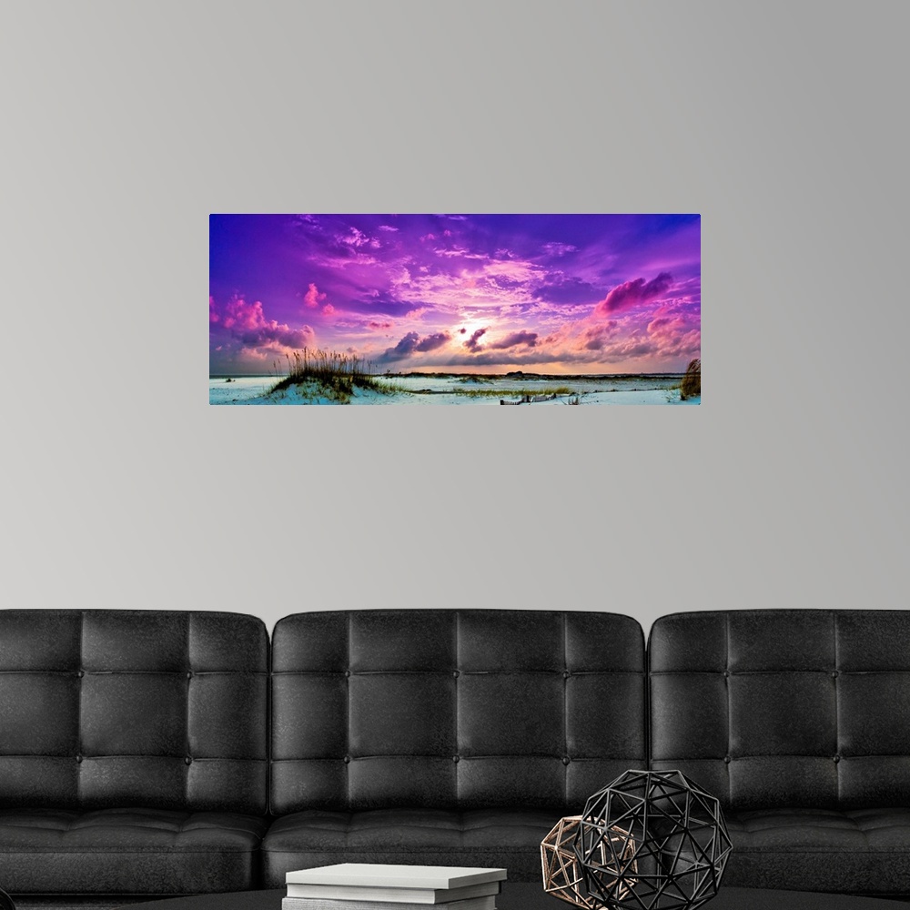 A modern room featuring Heavenly purple sunset skyscape panorama.