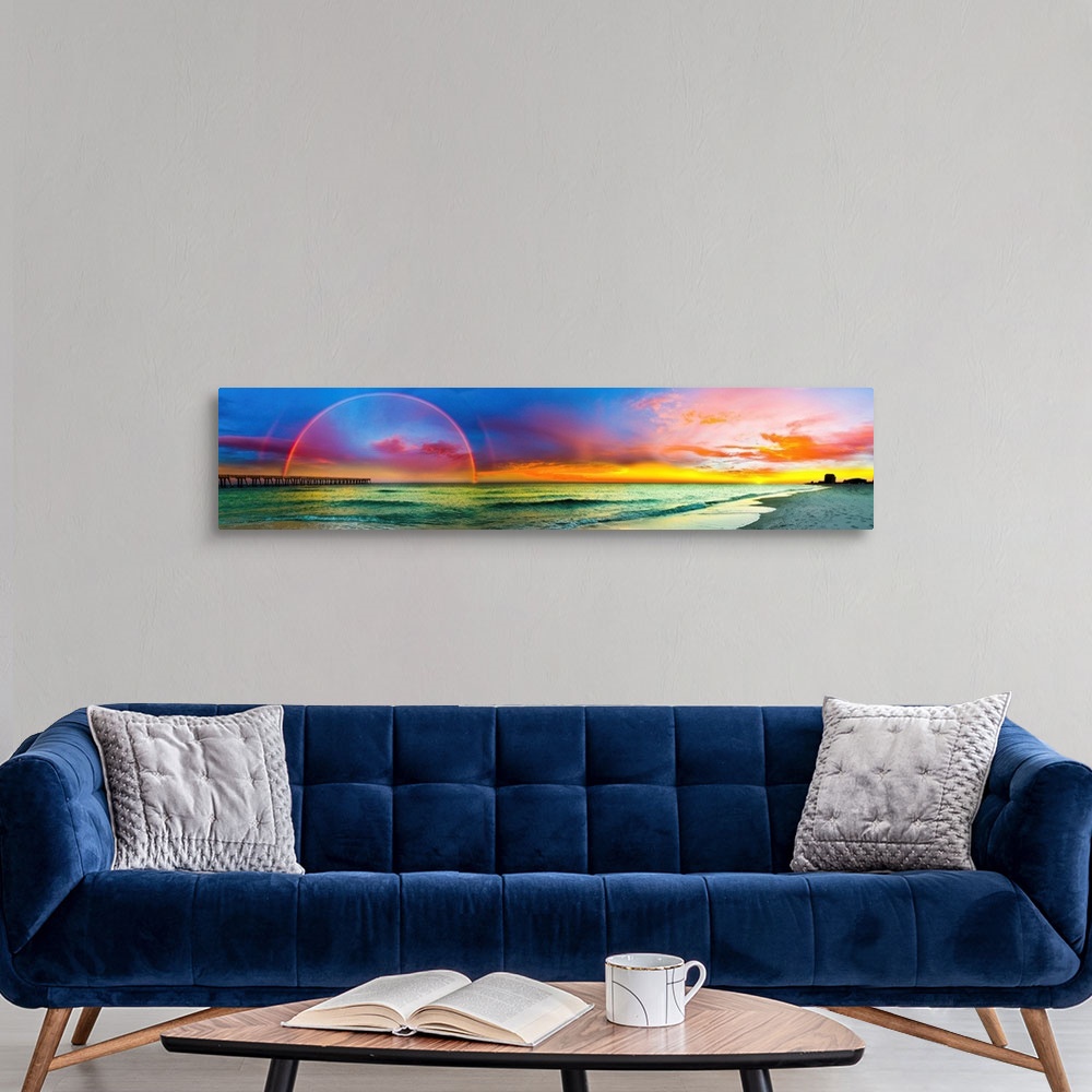 A modern room featuring A full rainbow across an ocean pier at sunset. The blue, purple, and red sky along with the green...