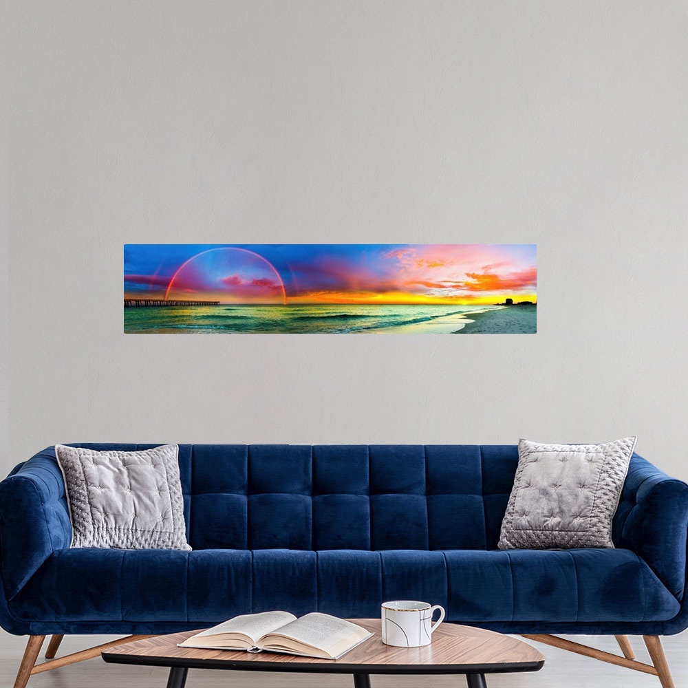A modern room featuring A full rainbow across an ocean pier at sunset. The blue, purple, and red sky along with the green...