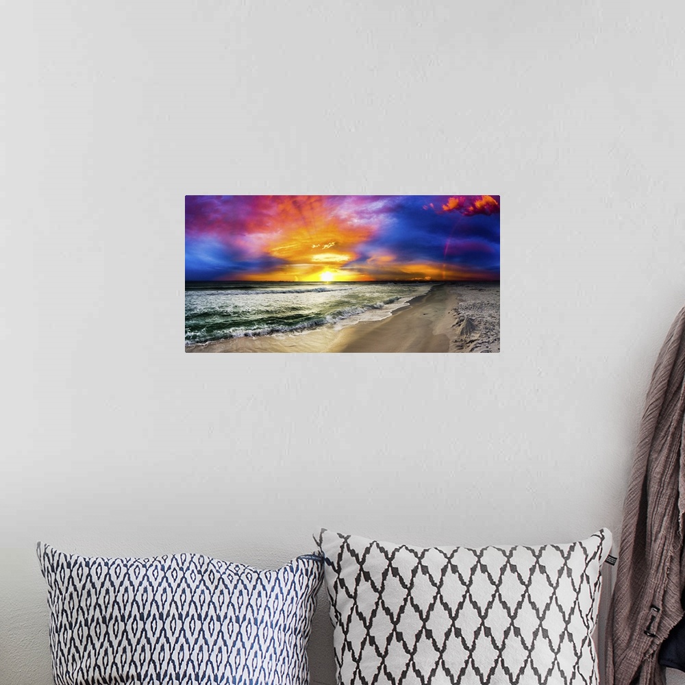 A bohemian room featuring A dark rainbow sunset with a beautiful blue, purple and red sky. This is a large beach panorama.