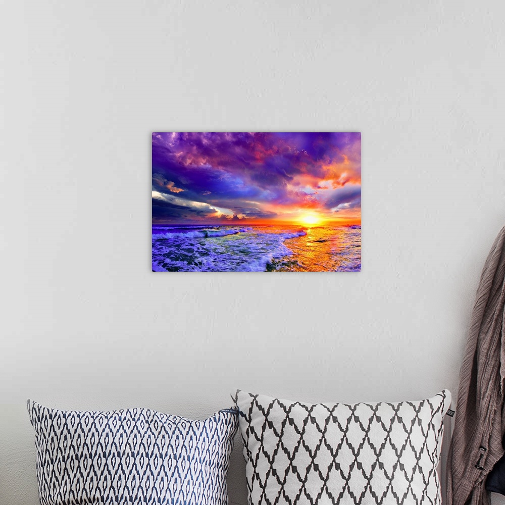 A bohemian room featuring A seascape before a bright burning pink purple sunset. A brilliantly illuminated skyscape. Landsc...