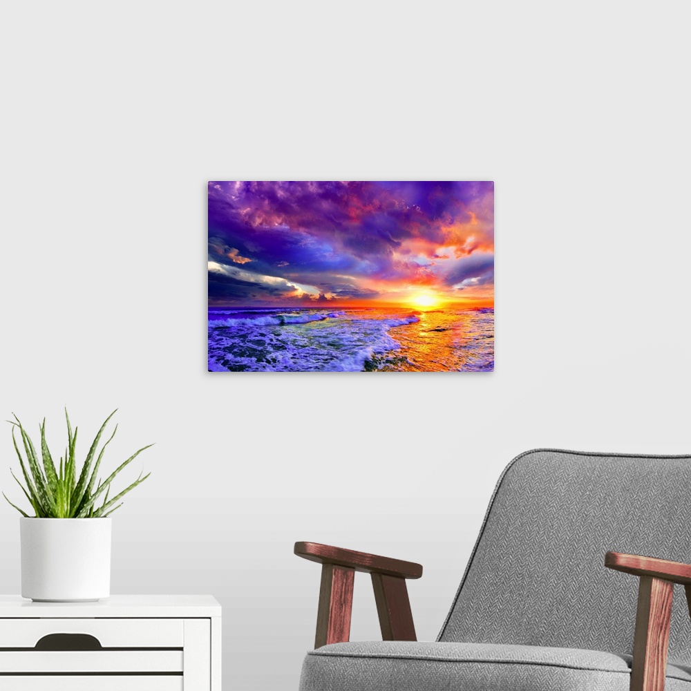 A modern room featuring A seascape before a bright burning pink purple sunset. A brilliantly illuminated skyscape. Landsc...