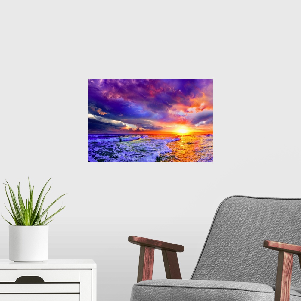 A modern room featuring A seascape before a bright burning pink purple sunset. A brilliantly illuminated skyscape. Landsc...