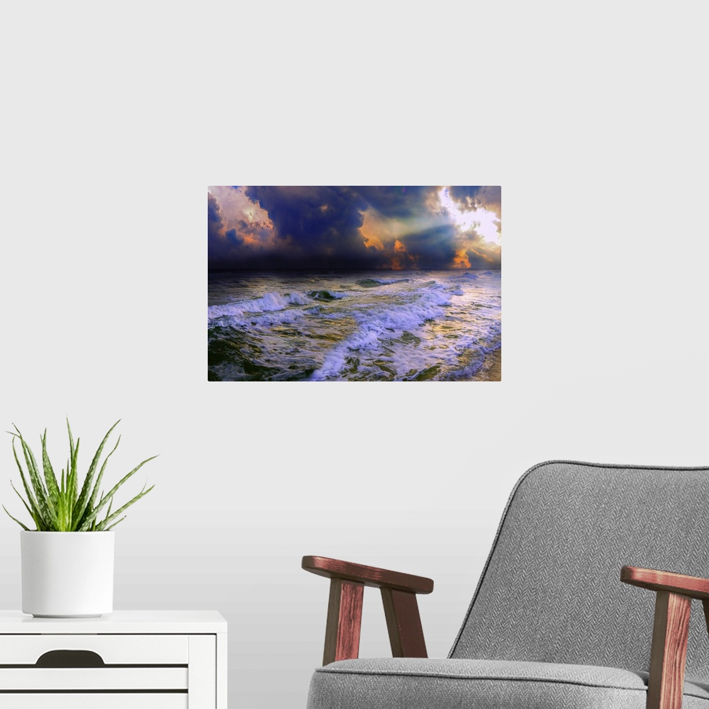 A modern room featuring Sun rays break through dark blue clouds on a stormy night over a dark ocean and waves.