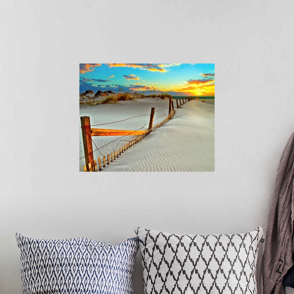 A bohemian room featuring A white sand beach sunset with a crooked wooden fence.