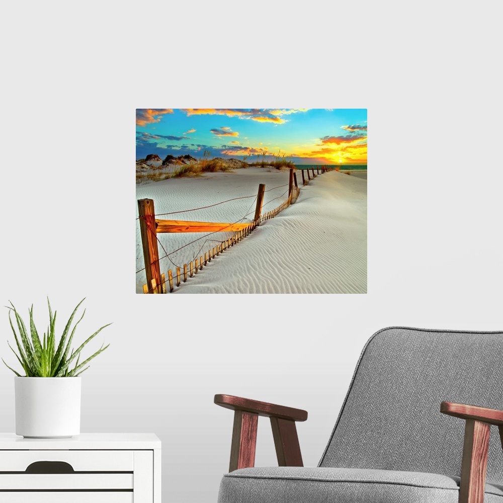 A modern room featuring A white sand beach sunset with a crooked wooden fence.
