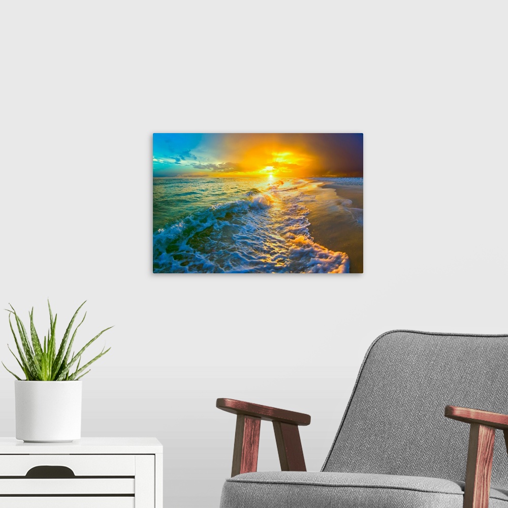 A modern room featuring An amazing sunset with yellow and orange sky and clouds.