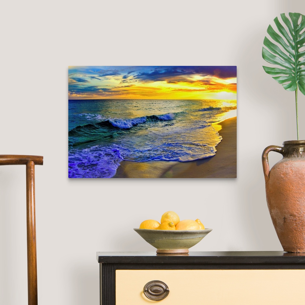 A traditional room featuring Image of waves rolling over Navarre beach before a dark yellow sunset seascape. Landscape taken o...