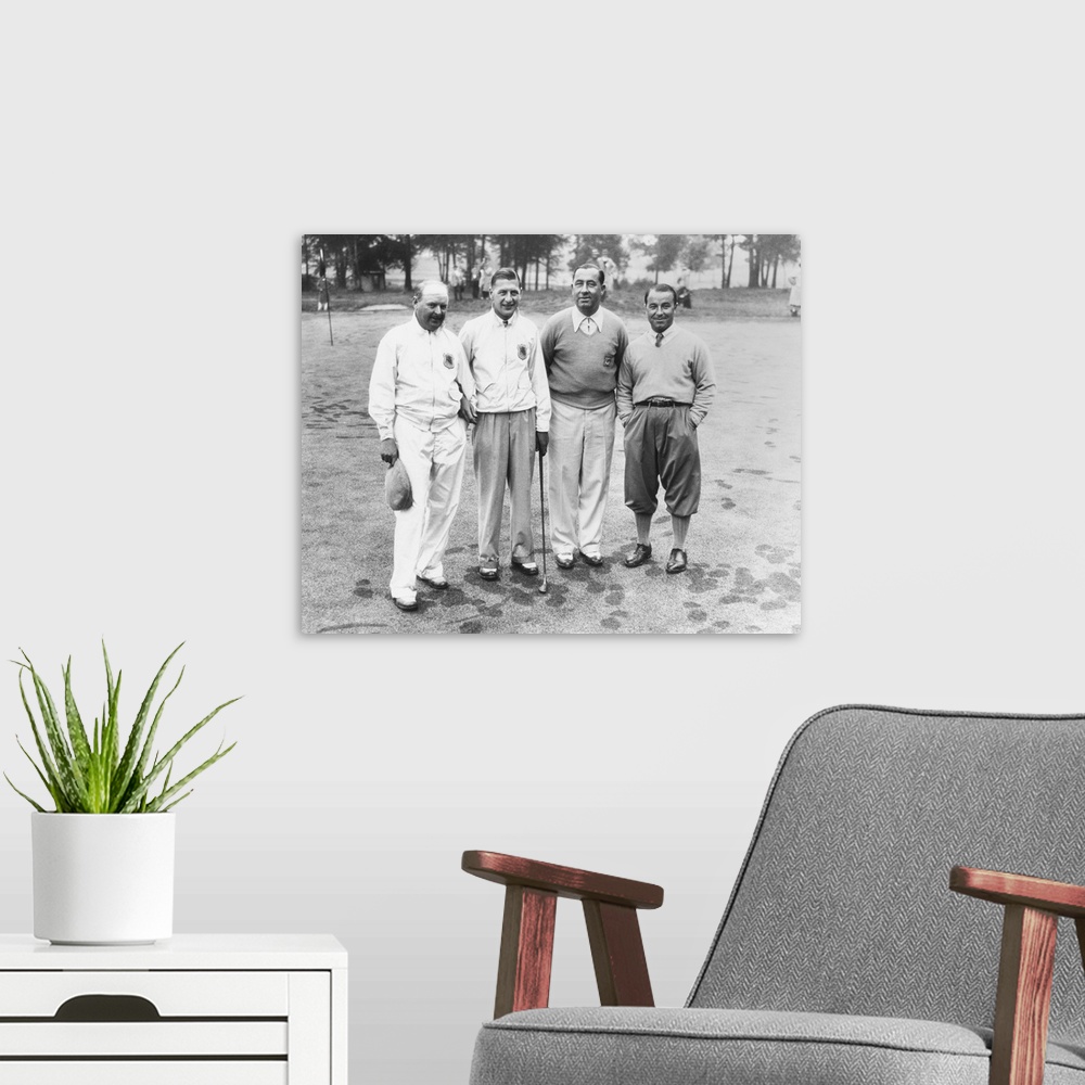 A modern room featuring 1935 Ryder Cup Scotch foursome. L-R: Alf Perry and John Busson of the British team; and Walter Ha...