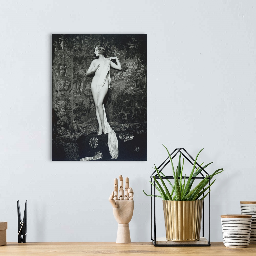 A bohemian room featuring Actress, dancer, and Ziegfeld girl Hazel Forbes. Full length portrait of Forbes nude and draped i...