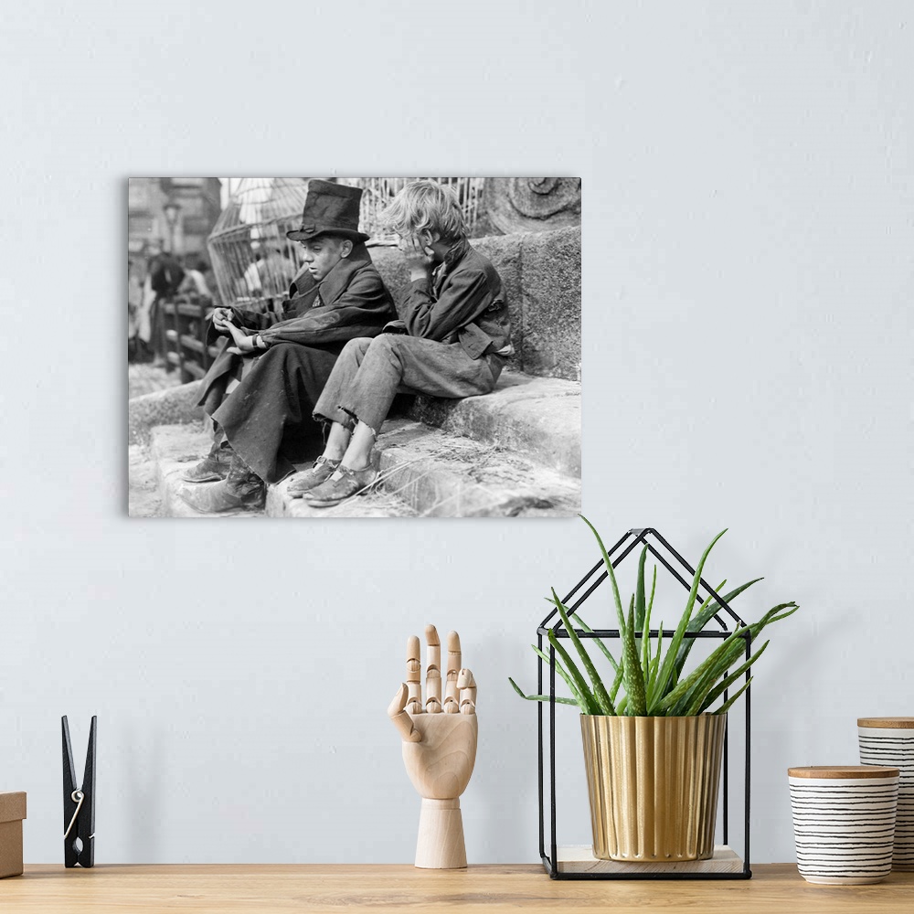 A bohemian room featuring Anthony Newley and John Howard Davies in Oliver Twist - Movie Still