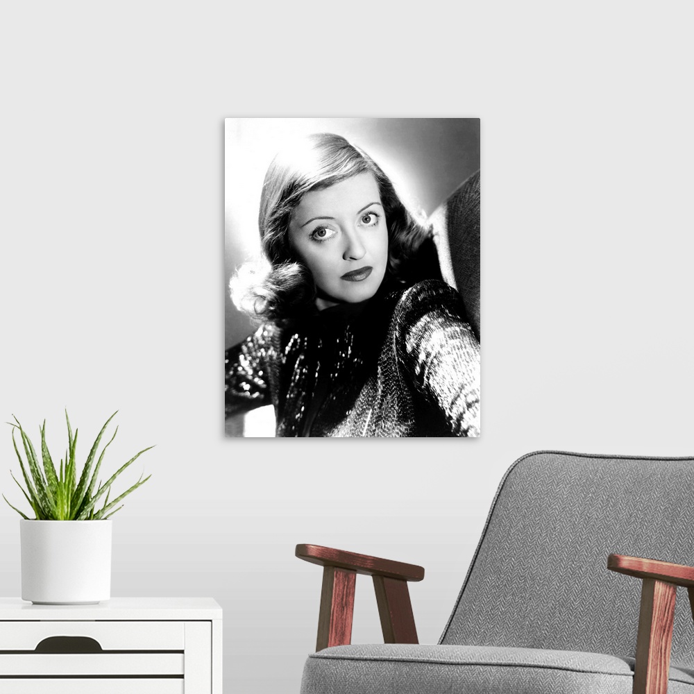 A modern room featuring Bette Davis, ca. 1946.