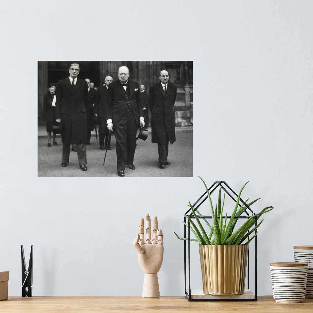 A bohemian room featuring British leaders leaving the Westminster Abby memorial service for David Lloyd George. L-R: Foreig...