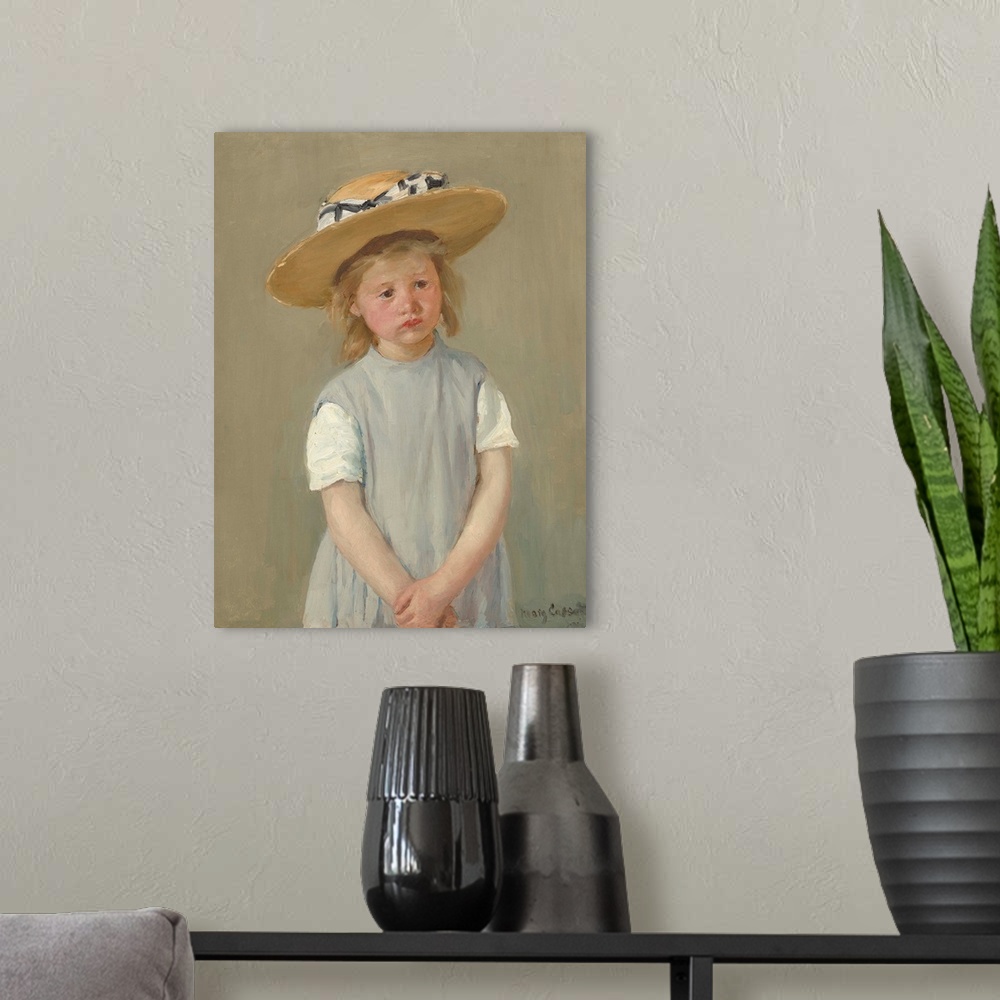 A modern room featuring Child in a Straw Hat, by Mary Cassatt, 1886, American painting, oil on canvas. Cassatt captures t...