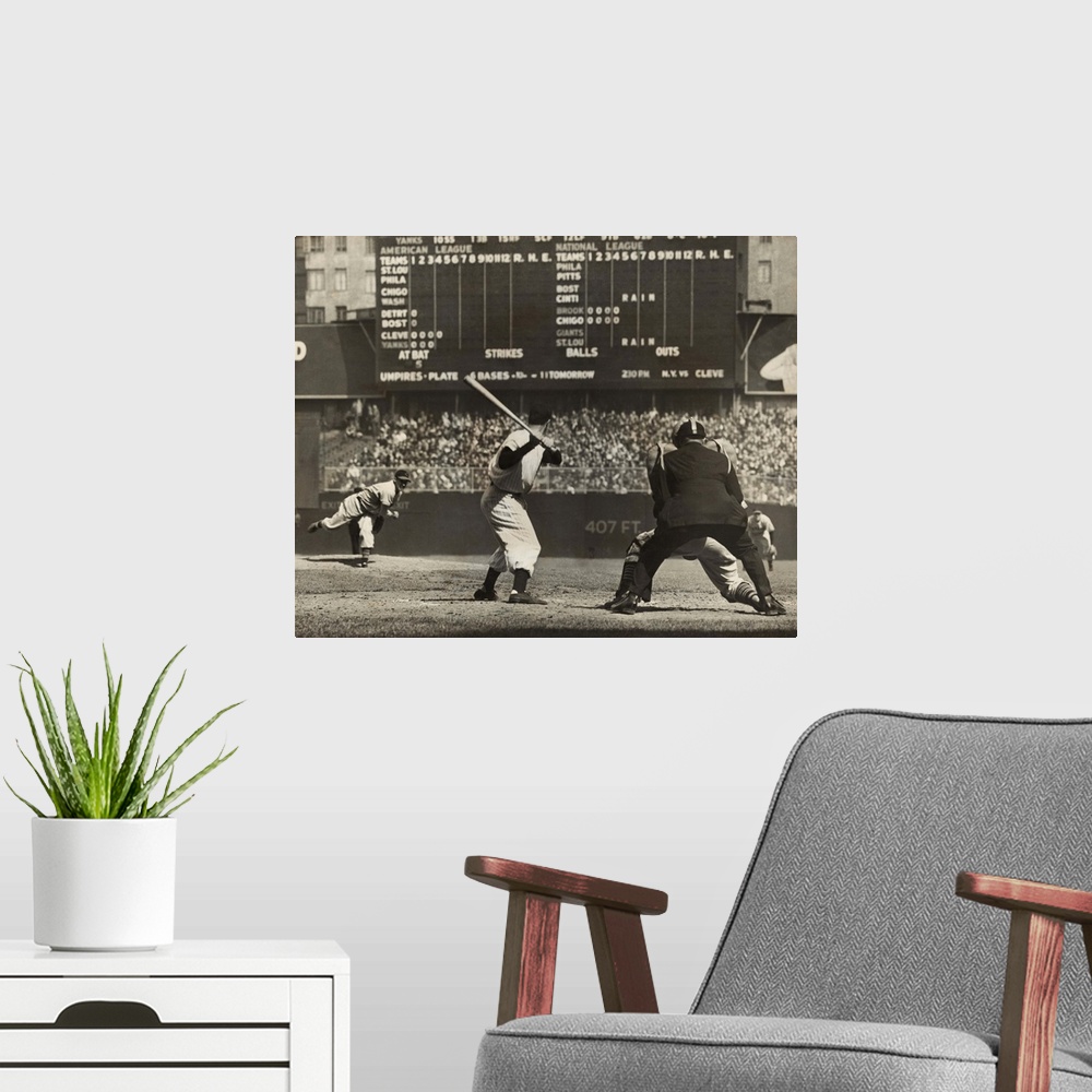 A modern room featuring Cleveland Indians', Bob Feller, pitching to New York Yankees' Joe DiMaggio. April 30, 1946. Frank...