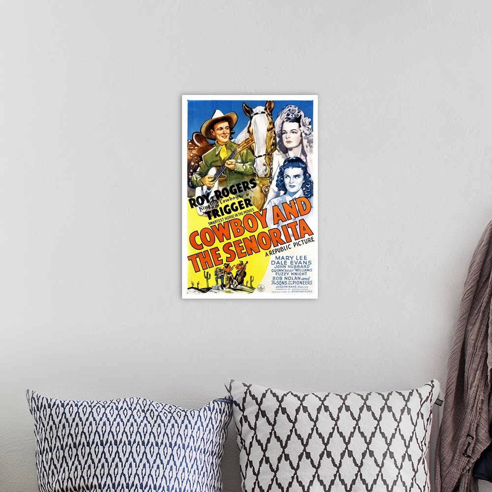 A bohemian room featuring Cowboy and the Senorita - Vintage Movie Poster