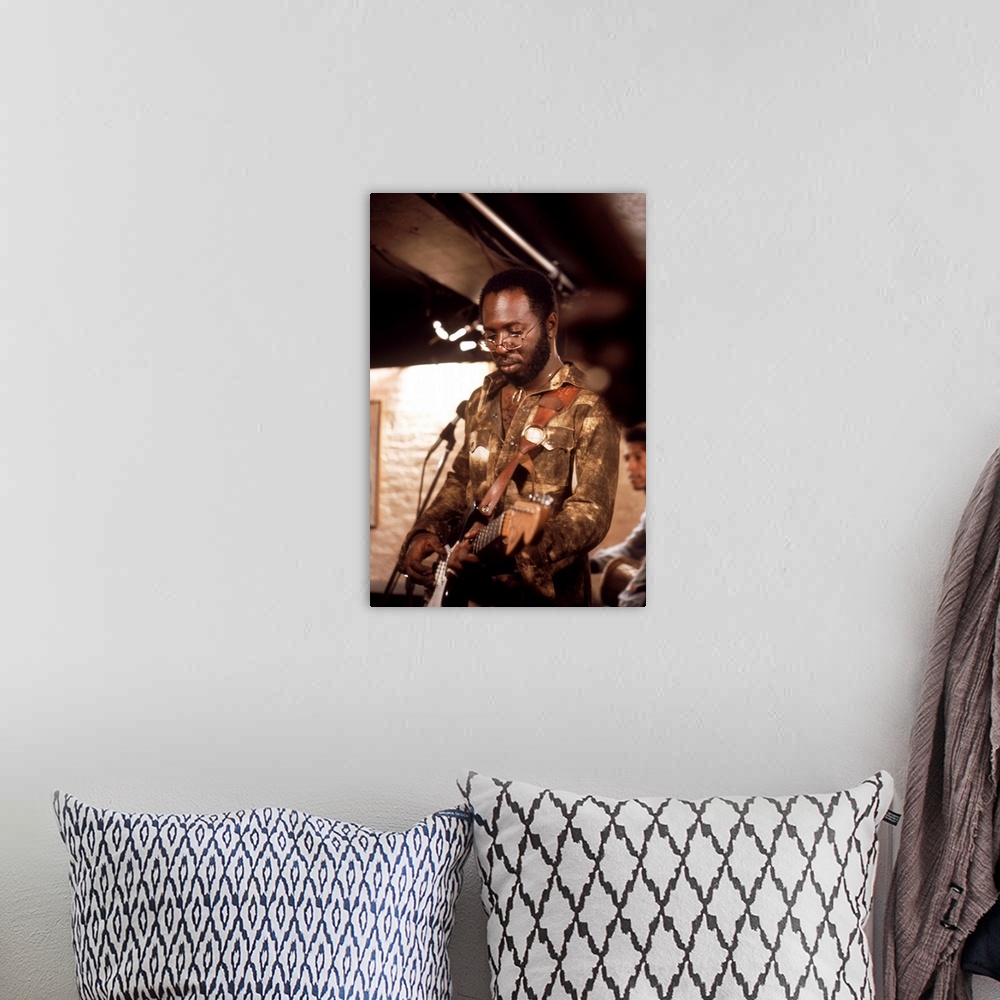 A bohemian room featuring Curtis Mayfield in Superfly - Movie Still