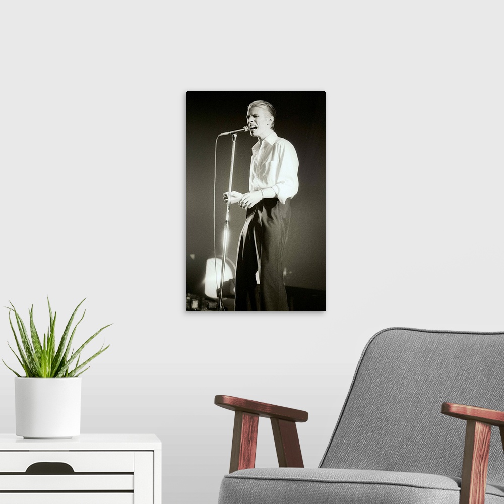 A modern room featuring David Bowie on stage, Isolar-1976 Tour (Thin White Duke Tour), Vorst Nationaal, Brussels, Belgium...