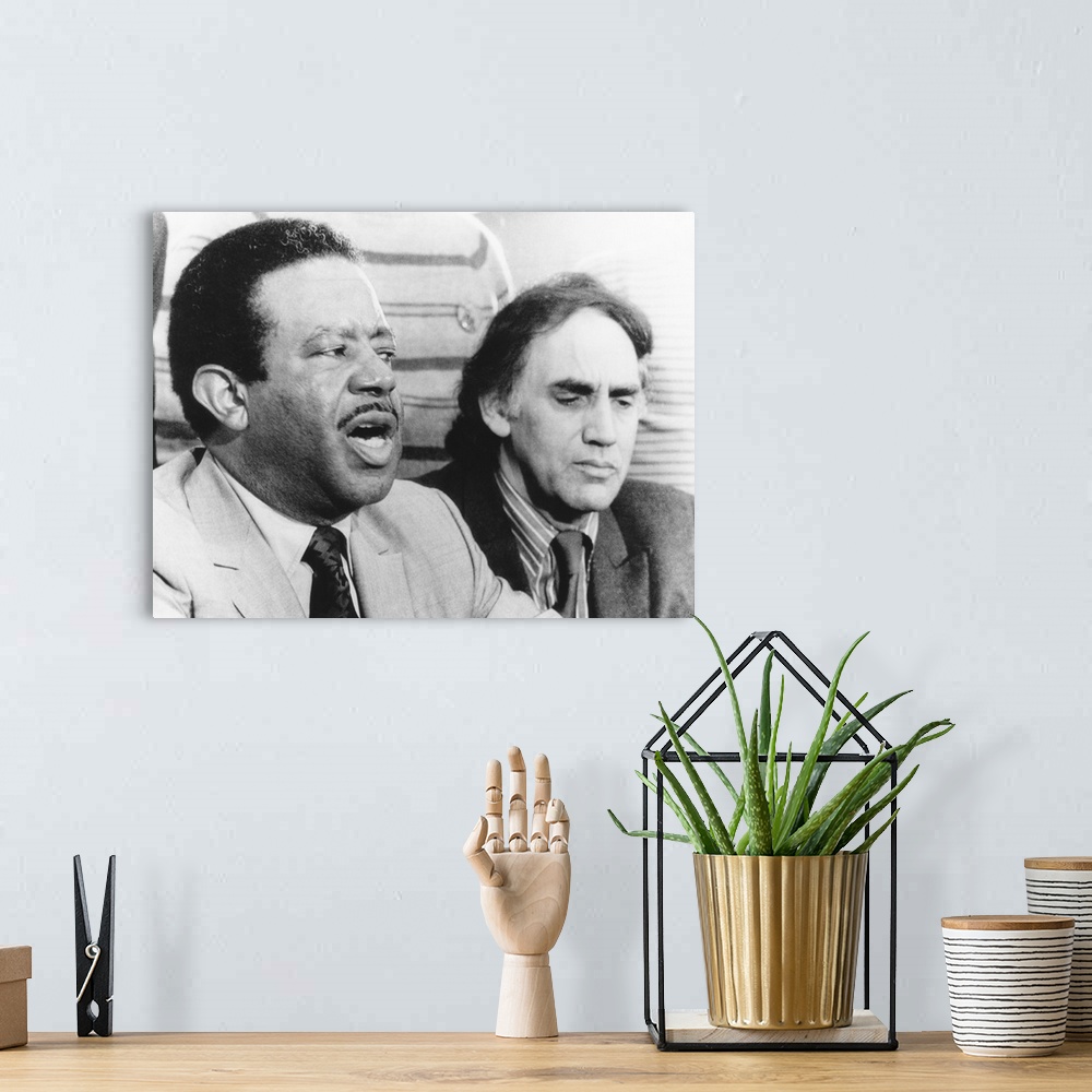 A bohemian room featuring Defense Attorney William Kunstler and Rev. Ralph Abernathy at end of the 'Chicago Seven' trial. K...
